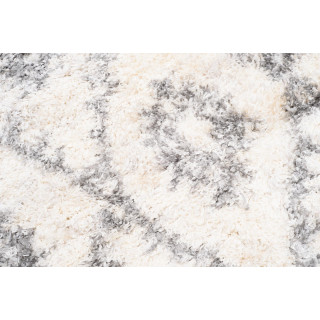 Kosmata preproga s kremnimi resicami