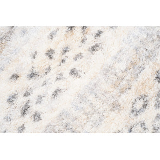 Kremno obarvana kosmata preproga z resicami