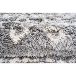 Temno siva kosmata preproga z resicami