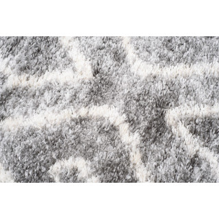 Temno siva preproga z resicami