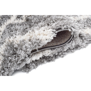 Temno siva preproga z resicami