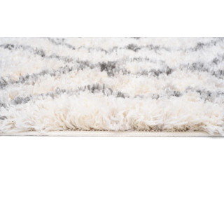 Krem vzorčasta preproga z resicami