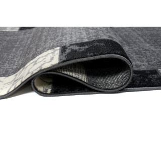 Siva preproga s preprostim vzorcem