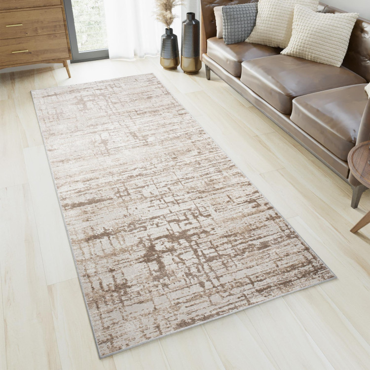 Krem preproga z nežnim vzorcem