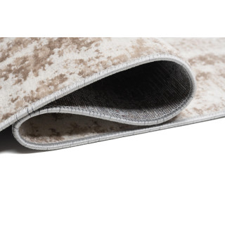 Moderna bež preproga z nežnim vzorcem