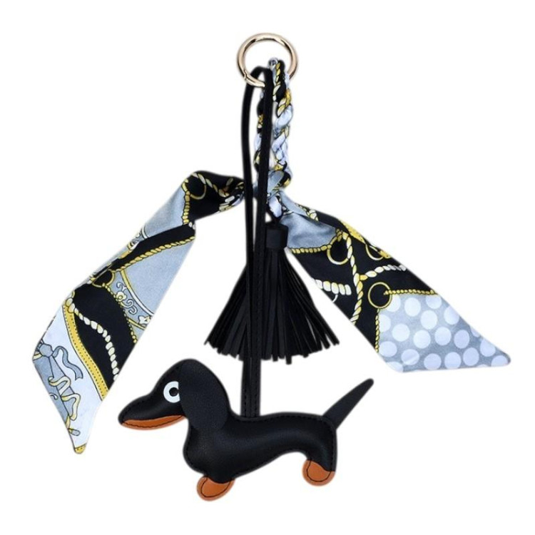 Črn usnjen obesek v obliki jazbečarja