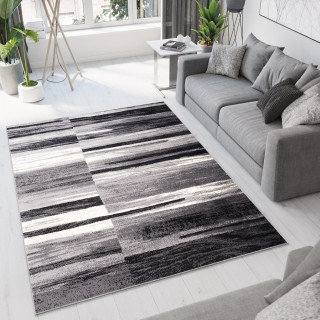 Preproga v sivi barvi