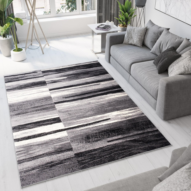 Preproga v sivi barvi