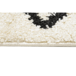 Kosmata kremna preproga s cikcakastim vzorcem