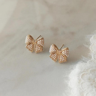 Ženski uhani v obliki pentlje z biseri