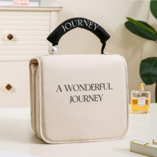 Kremna zložljiva kozmetična torba