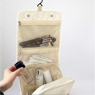 Kremna zložljiva kozmetična torba