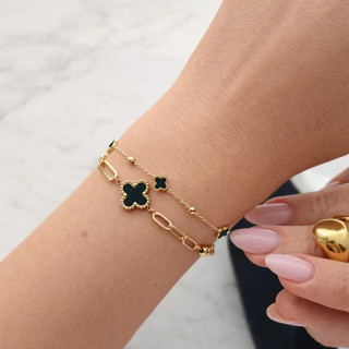 Ženska pozlačena zapestnica s črno štiriperesno deteljico