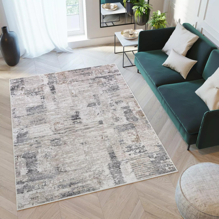 Moderna kremna preproga z nežnim vzorcem