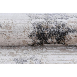 Moderna kremna preproga z nežnim vzorcem