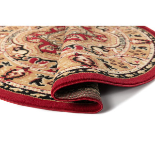 Okrogla rdeča vzorčasta preproga