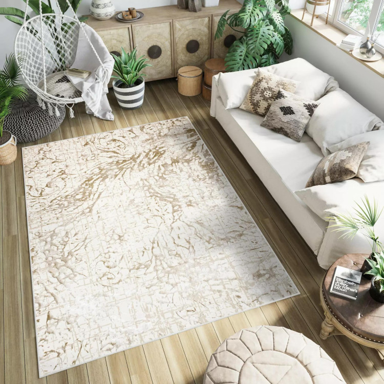 Moderna vzorčasta preproga v kremni barvi