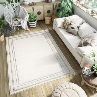 Moderna vzorčasta preproga v beli barvi