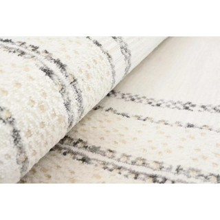 Moderna vzorčasta preproga v beli barvi