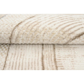 Moderna vzorčasta preproga v krem barvi