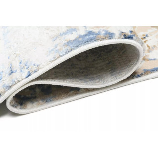 Vzorčasta kremna preproga