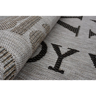 Siva črtasta preproga z napisi