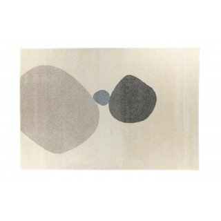 Krem preproga z abstraktnimi vzorci