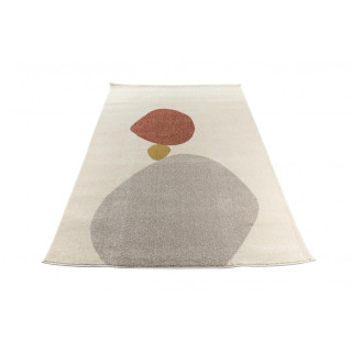 Krem preproga z abstraktnimi vzorci