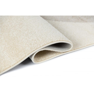 Krem preproga z abstraktnimi vzorci