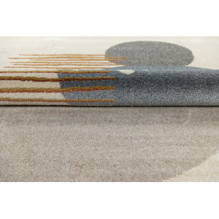 Krem preproga z abstraktnimi vzorci