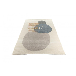 Krem preproga z abstraktnimi vzorci