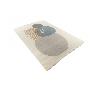 Krem preproga z abstraktnimi vzorci