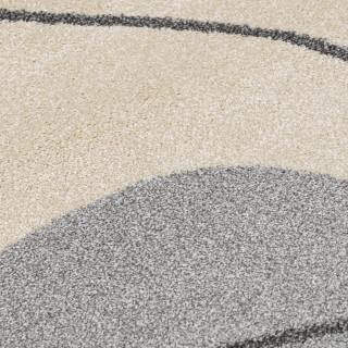 Krem preproga z abstraktnimi vzorci