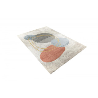 Krem preproga z abstraktnimi vzorci