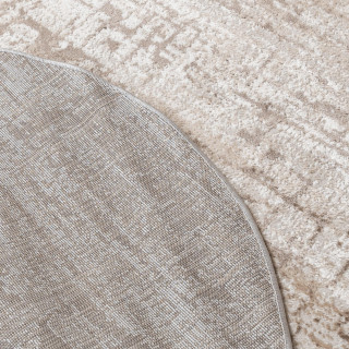 Okrogla bež preproga z vzorcem