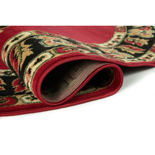 Ovalna rdeča preproga z vzorcem