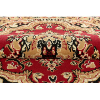 Rdeča ovalna preproga z vintage vzorcem