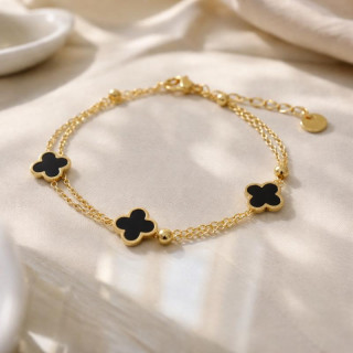 Dvojna zapestnica s črnimi deteljicami