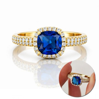 Pozlačen zaročni prstan z modrim cirkonom