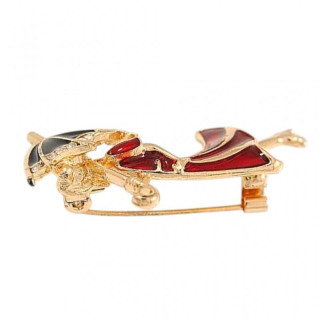 Broška v obliki ženske z dežnikom