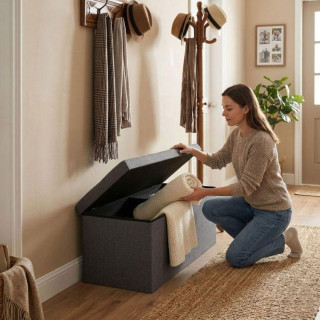 Prešit temno siv stolček s prostorom za shranjevanje