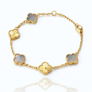Pozlačena zapestnica s štiriperesnimi deteljicami